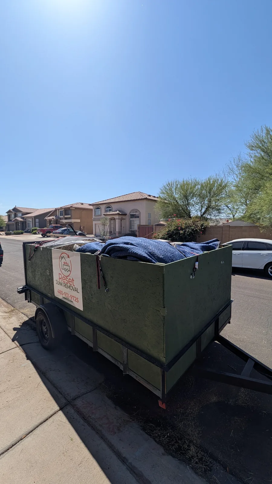 Mixed brush and bulk junk contained in the trailer after a Peoria pickup