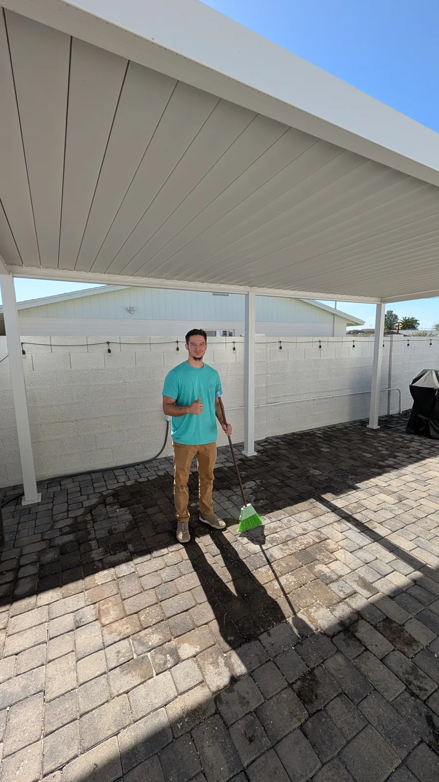 Cleared paver area beneath the patio cover after hot tub removal