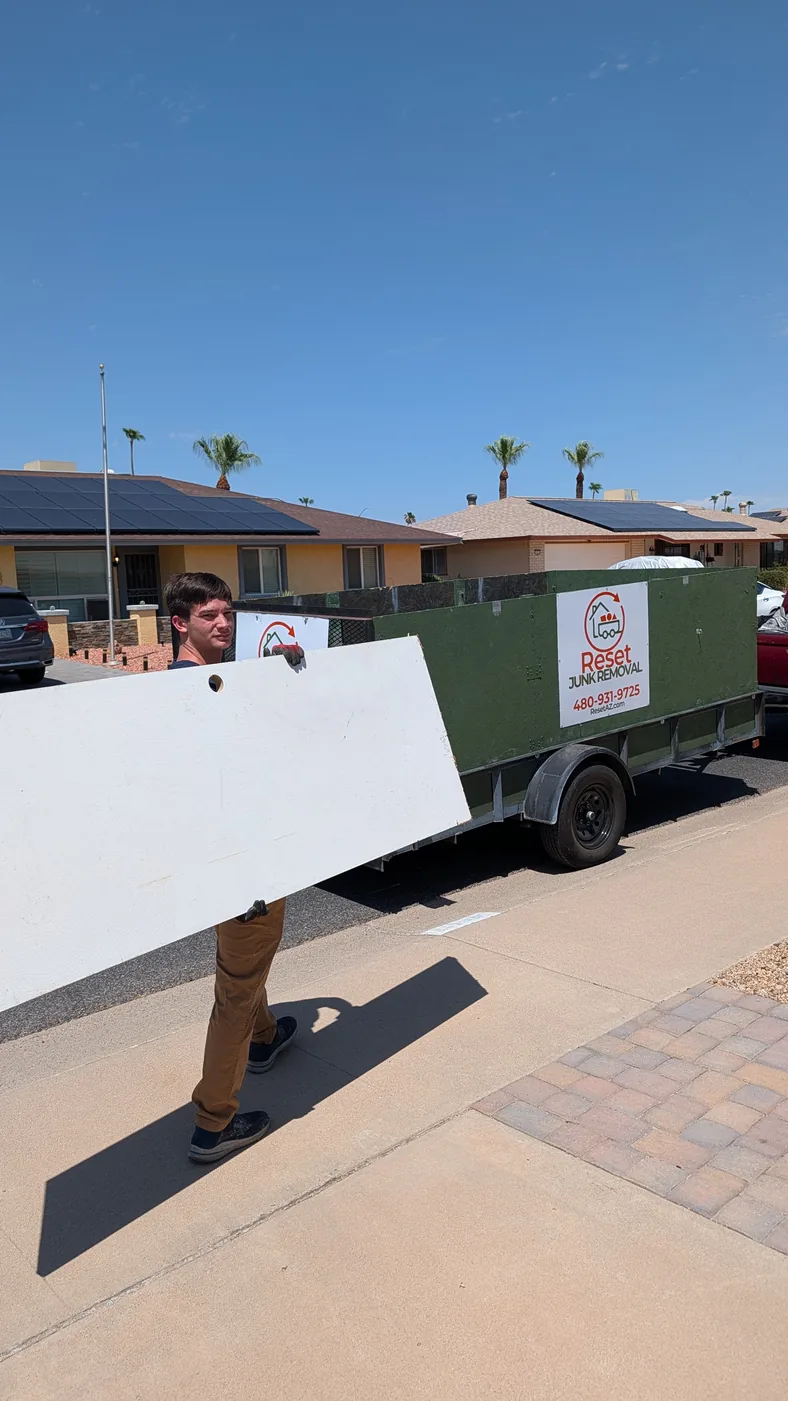 Furniture removal in progress by Reset Junk Removal in Peoria