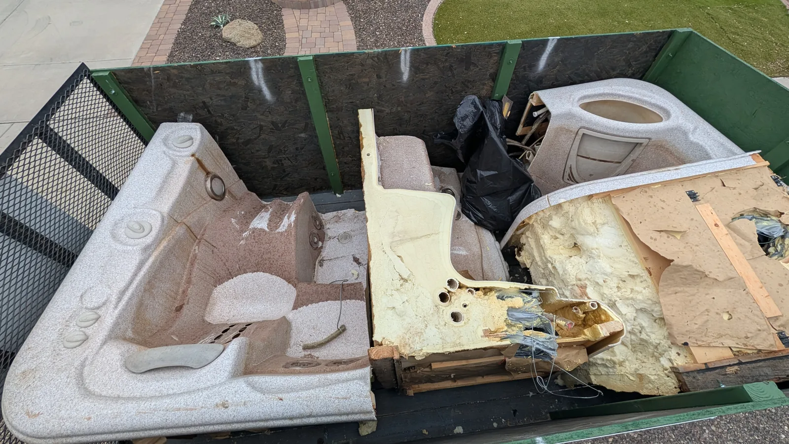 Hot tub shell and components loaded after removal in North Phoenix