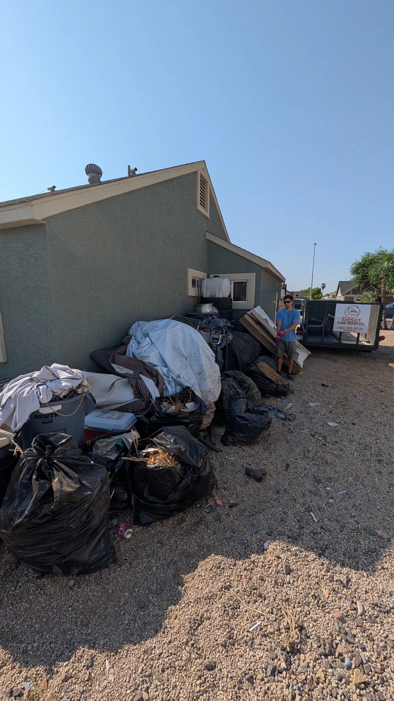 Mixed household junk removal in progress in Peoria