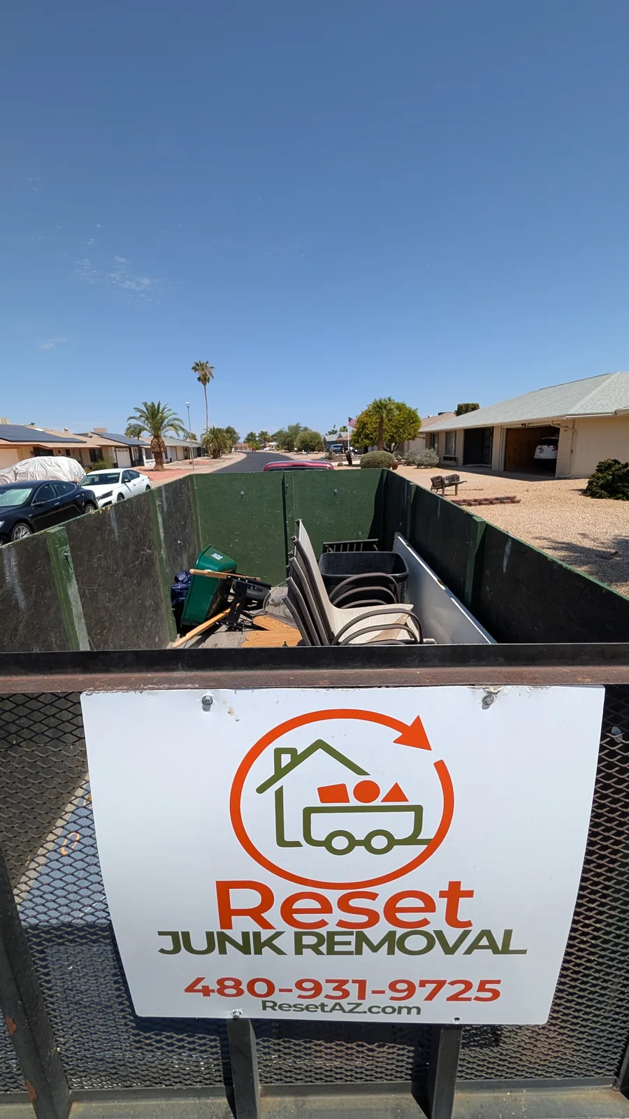 Patio chairs, bins, and long pieces loaded during a Sun City pickup