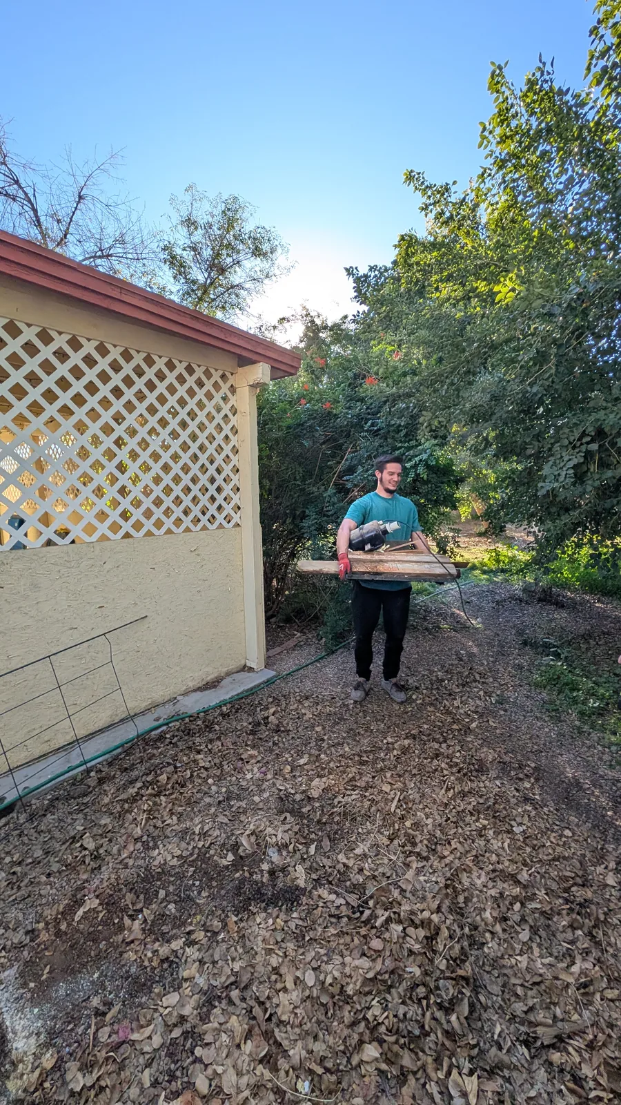 Cleared gravel footprint after Peoria side-yard hot tub removal