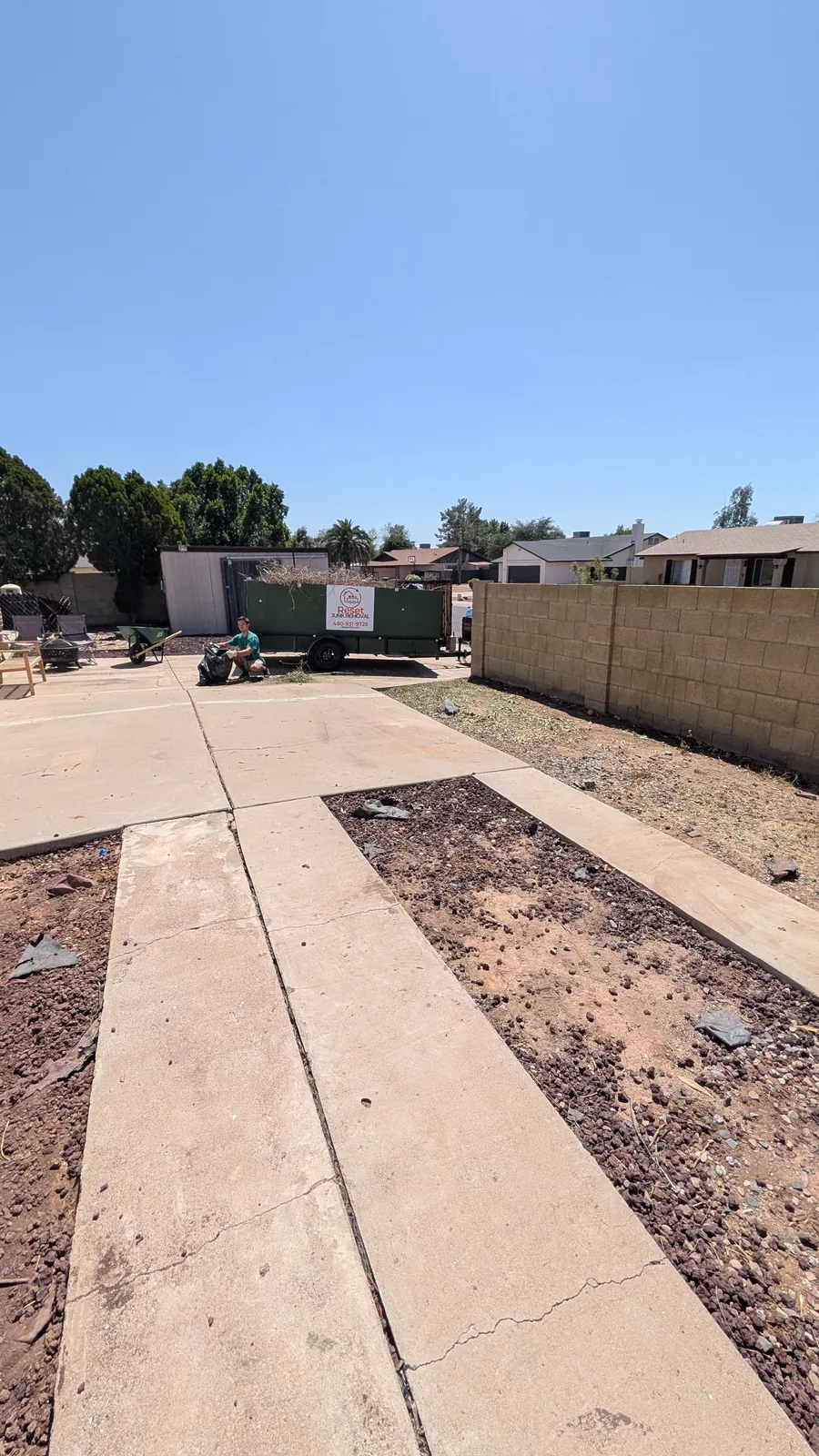 Concrete side area after the yard waste pile was removed